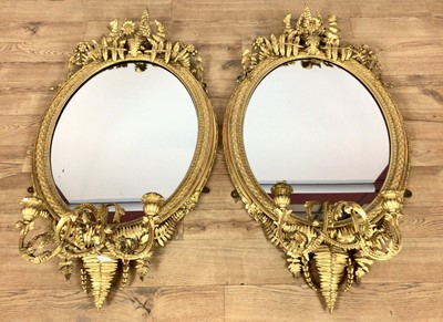Lot 791 - Pair of mid Victorian giltwood and gesso girandoles with fern ornament