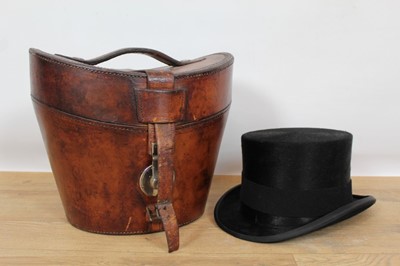 Lot 758 - Top hat in leather case