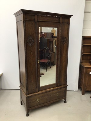 Lot 166 - 1920's carved oak wardrobe by C.W.S. Cabinet Factory Bristol, together with a similar dressing chest, comode and pair of bedroom chairs (5)