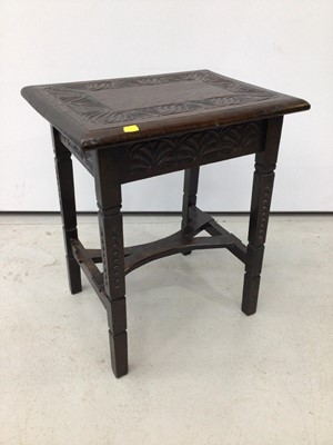 Lot 167 - Antique carved oak side table together with a similar stool (2)