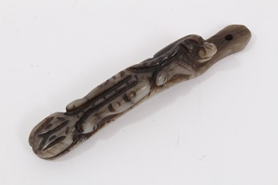 Lot 461 - Chinese carved green jade buckle, 9.3cm long