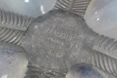 Lot 80 - Lalique 'Coquille' pattern opalescent glass hanging  lamp shade , etched 'R. Lalique, France', 30cm diameter