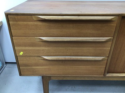 Lot 187 - Mid 20th century Teak sideboard with three drawers and two doors bearing label A.H McIntosh & Co Ltd