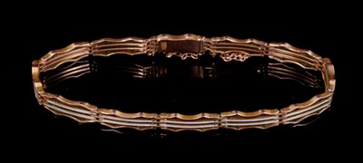 Lot 239 - Edwardian 9ct rose gold and white enamel gate bracelet concealed clasp