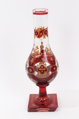 Lot 47 - Bohemian glass hookah base, decorated with gilt foliate patterns on a red ground, 29.5cm height