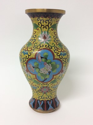 Lot 486 - Chinese cloisonné vase, of baluster form, decorated with flowers on a yellow ground, 31.5cm height