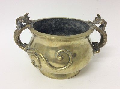 Lot 488 - Chinese bronze censer, with dragon form handles, six-character mark to base, 15cm height x 24 cm across