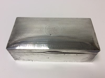 Lot 152 - George V silver cigarette box of rectangular form, domed hinged cover with engine turned decoration, cedar lined interior (Birmingham 1920), makers mark rubbed, 17.7cm in length