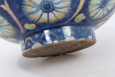 Lot 128 - William de Morgan lustre bowl decorated with flower-head motifs, 1888-1907 blue period