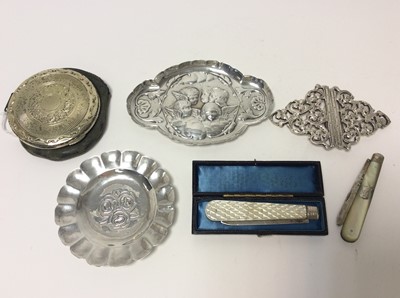 Lot 158 - Victorian silver pin dish with embossed decoration depicting Reynolds Angels (London 1897), maker William Comyns together with a Victorian style silver nurses buckle (Birmingham 1973), silver compa...