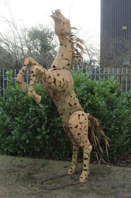 Lot 759 - Very large patinated metal sculpture of a rearing horse, total height approximately 245cm