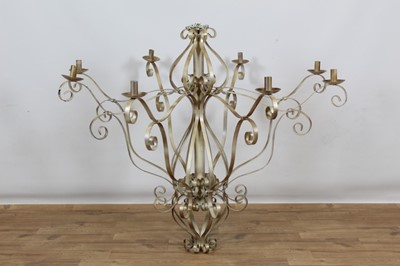 Lot 797 - A massive painted wrought metal chandelier