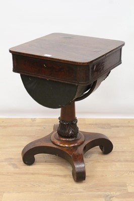 Lot 907 - Regency mahogany crossbanded worktable of bold proportions standing on good carved central column above platform base