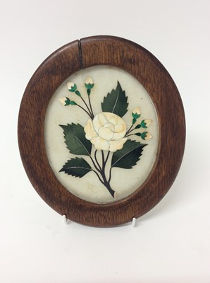 Lot 441 - Pietra dura oval plaque, depicting a flowering rose, on white ground, mounted in oval hardwood frame