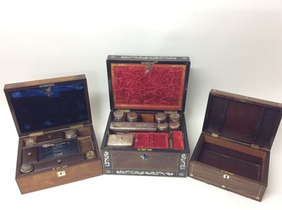 Lot 449 - William IV rosewood toiletry box with mother of pearl inlay, together with two other boxes (3)