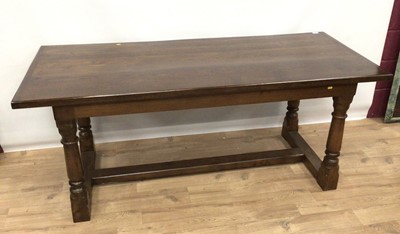 Lot 172 - Solid oak dining table on baluster turned legs joined by H-shaped stretcher