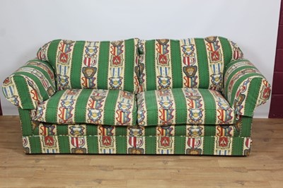 Lot 824 - Pair of modern sofas, each with striped green and decorative shield upholstery, 181cm wide