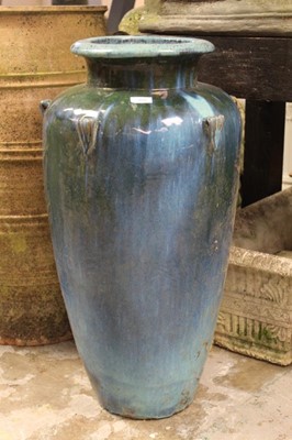 Lot 855 - Tall and slender flambé glazed garden vase