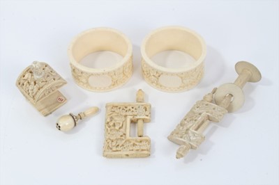 Lot 491 - Three Cantonese carved ivory sewing clamps and other ivory items