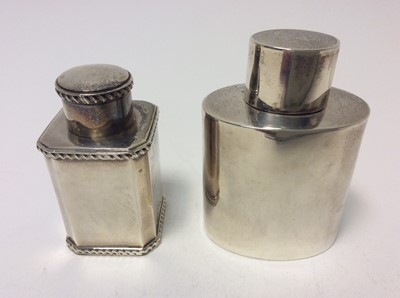 Lot 203 - Victorian silver tea caddy of square form with canted corners and gadrooned borders, slip on cover, (Birmingham 1887), maker Thomas Hayes, together with a Victorian silver tea caddy of oval form wi...