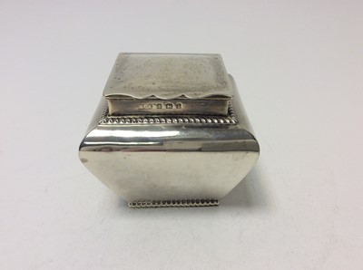 Lot 204 - Edwardian silver tea caddy of bombe form, with gadrooned borders and domed hinged cover with gilded interior (Birmingham 1908), maker W.G.K., all at 8oz, 7.7cm in height