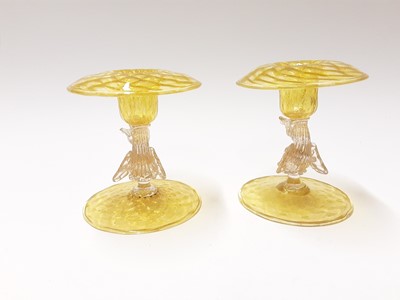 Lot 366 - Two good quality Murano Venitian yellow glass dolphin candlesticks