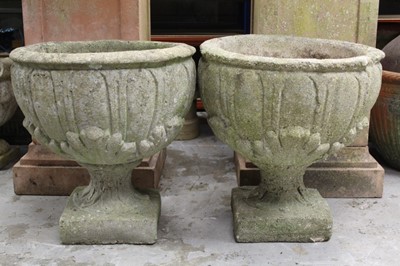 Lot 860 - Pair of concrete garden urns