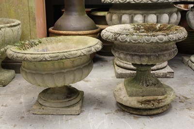 Lot 861 - Two concrete garden urns
