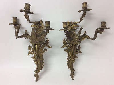Lot 474 - Pair 19th century ormolu three branch rococo wall sconces