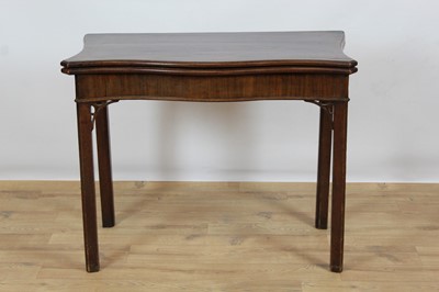Lot 960 - George III serpentine mahogany card table