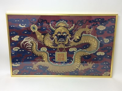 Lot 476 - 19th century Chinese silk dragon panel in glazed frame