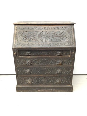 Lot 46 - 19th century carved oak bureau