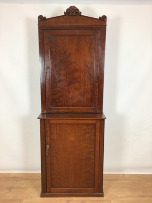 Lot 892 - Early Victorian mahogany two height enclosed cupboard