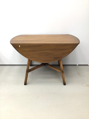 Lot 31 - Ercol elm drop leaf table together with a set five Ercol dining chairs