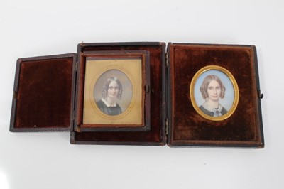 Lot 892 - George Elgar Hicks portrait miniature of his wife, together with another copy after the original, in original leather covered frames