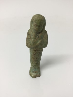 Lot 506 - Ancient Egyptian green faience hieroglyphic ushabti figurine, c.404-343 BC, 8.5cm length