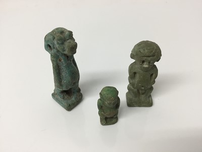 Lot 510 - Ancient Egyptian pale turquoise faience amulet of Tawaret, and two amulets of Ptaichos, the largest measuring 4.5cm height (3 items)