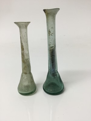 Lot 514 - Two Roman glass unguentarium, the largest 11.5cm height