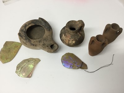Lot 516 - Roman items, including an oil lamp and flagon, a tiny amulet of Jasper, and some items possibly later, including two amphora and three iridescent glass shards
