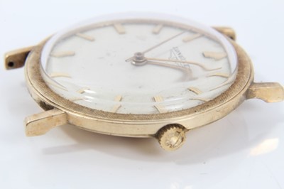 Lot 353 - 1960s gentlemen's 14K gold Longines wristwatch wit manual wind movement, circular dial with applied gold baton hour markers, central seconds and gold hands, the gold bezel with engine turned decora...