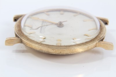 Lot 353 - 1960s gentlemen's 14K gold Longines wristwatch wit manual wind movement, circular dial with applied gold baton hour markers, central seconds and gold hands, the gold bezel with engine turned decora...