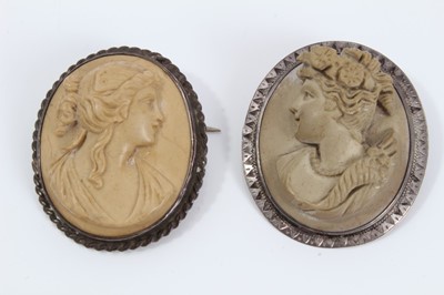 Lot 573 - Two late 19th century Italian carved lava cameos depicting classical female busts, one titled to the reverse 'Psiche', both in silver brooch mounts, approximately 36mm x 30mm