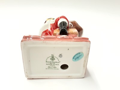 Lot 39 - Two Royal Doulton figures - Santa Claus HN4175 and Sir Winston Churchill HN3057
