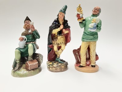 Lot 47 - Three Royal Doulton figures - The Pied Piper HN2102, Robin Hood HN2773 and Punch and Judy Man HN2765