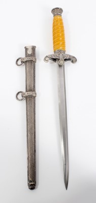 Lot 947 - Second World War Nazi Wehrmacht 1935 pattern officers' dress dagger with silver plated pommel and crossguard, plastic grip, plain blade - retaining almost all original polish in scabbard