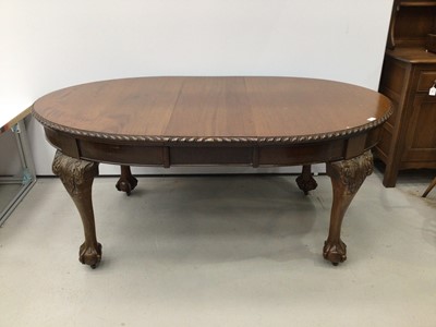 Lot 108 - 1920s mahogany extending dining table