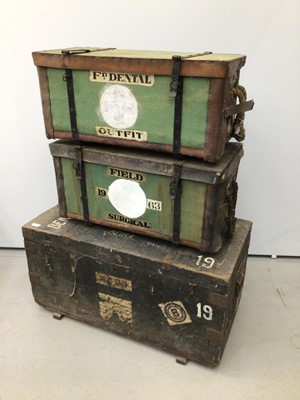Lot 112 - Two army canvas travelling cases, together with another travelling trunk