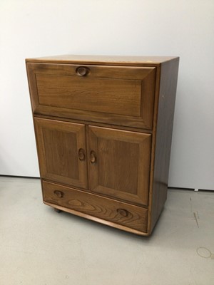 Lot 37 - Ercol golden dawn elm drinks cabinet