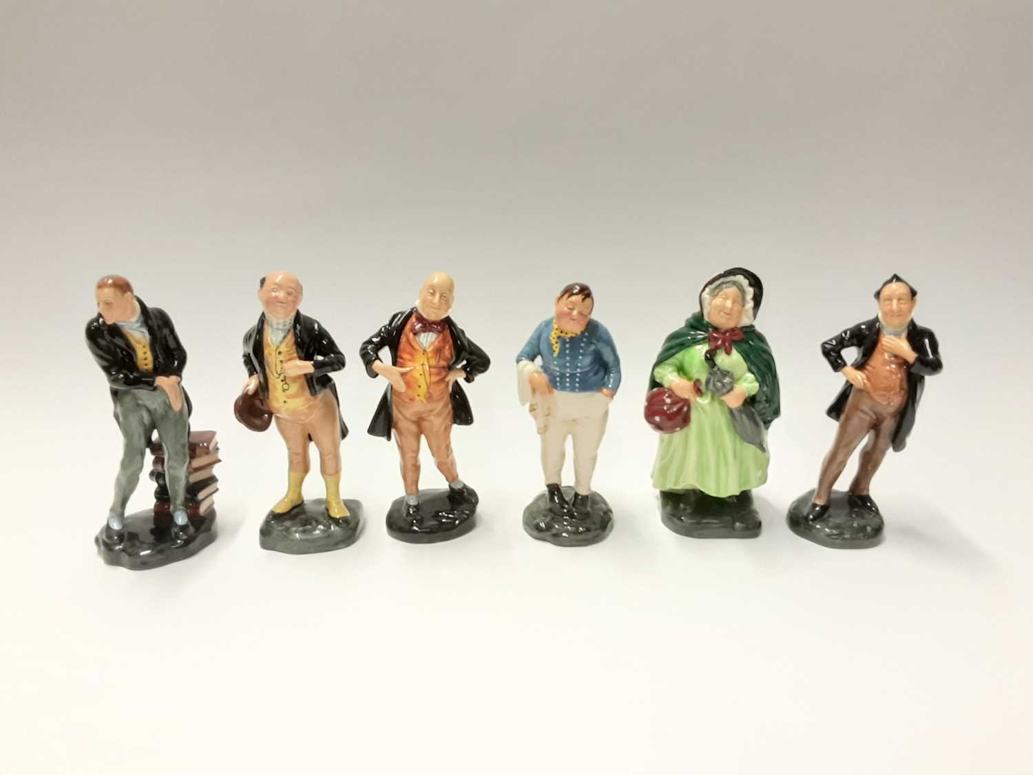Lot 146 - Six Royal Doulton figures - Fat Boy HN2096, Uriah Heep HN2101, Pecksniff HN2098, Micawber HN2097, Pickwick HN2099 and Sairy Gamp HN2100