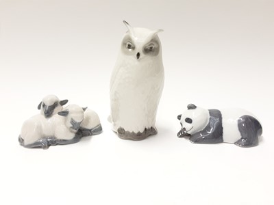 Lot 154 - Seven Royal Copenhagen porcelain animals and birds including Owl, panda, lambs etc, model numbers 155, 665, 2769, 1874, 2168, 125 and rabbit eating greens